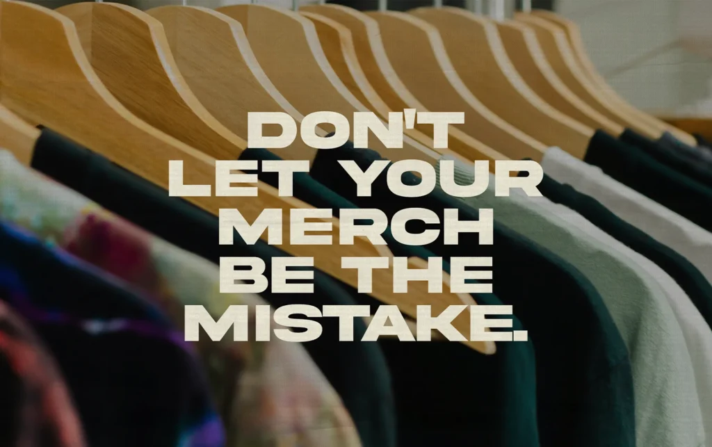 Custom merch apparel on clothing racks, highlighting branded merchandise and common merch planning mistakes.